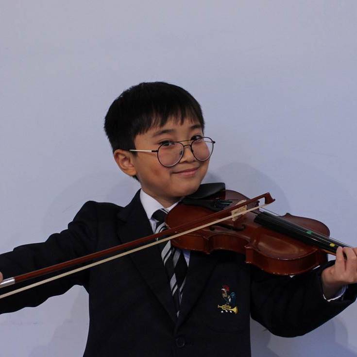 Violinist Joins National Orchestra