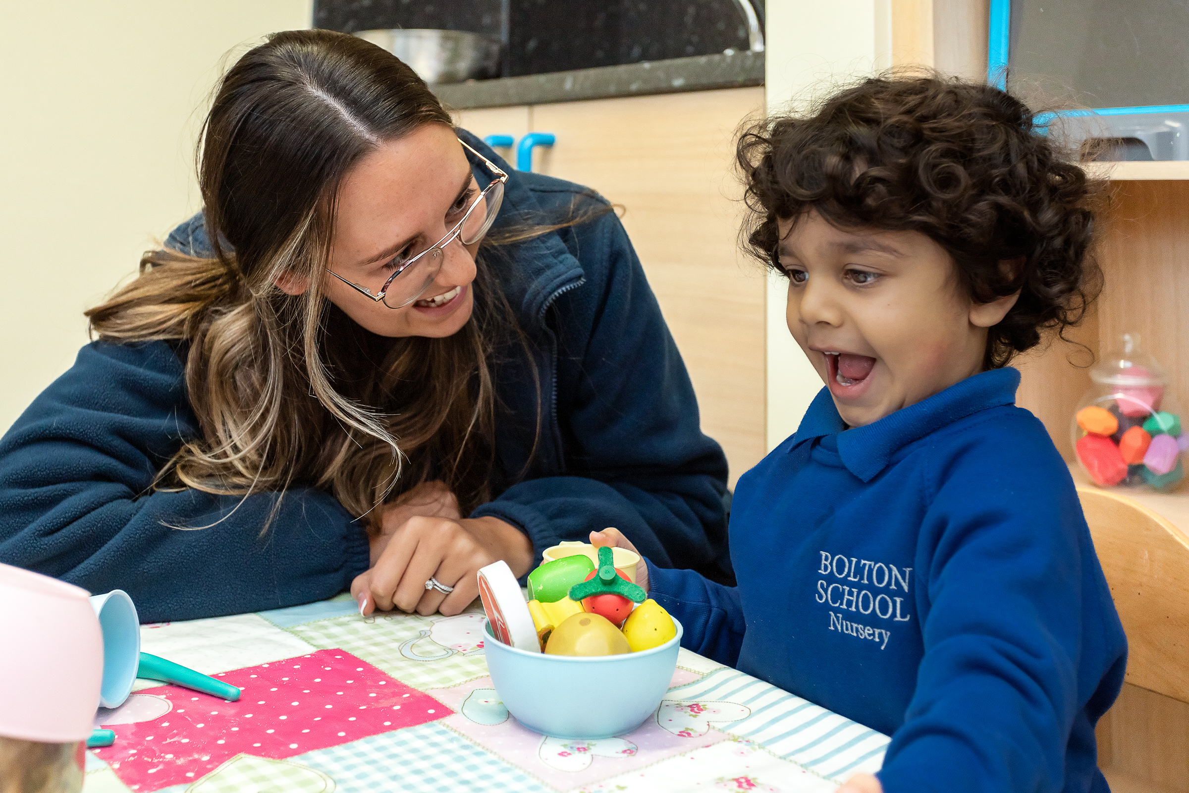 A child having fun at Bolton School Nursery